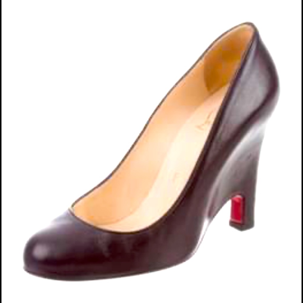Black Leather Christian Louboutin round-toe pumps with covered heels.